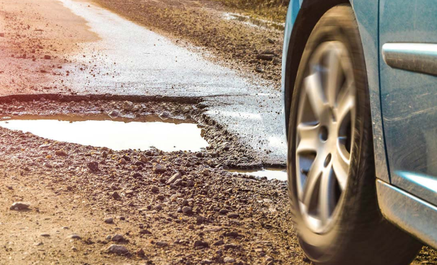 Guide Entretien Pneus : Survivre aux Nids-de-Poule de Bouaké à San-Pédro